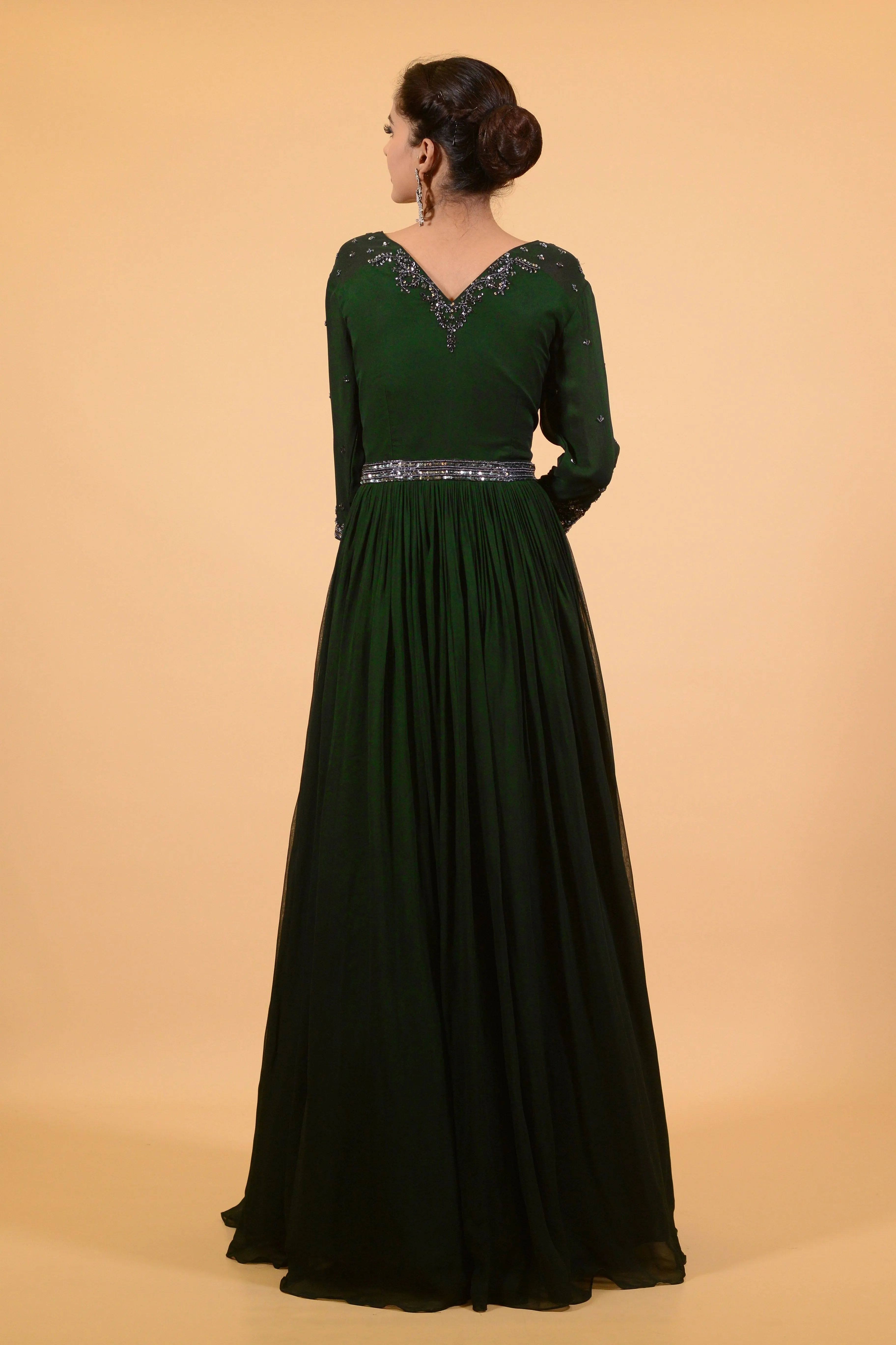Dark jade green gown.