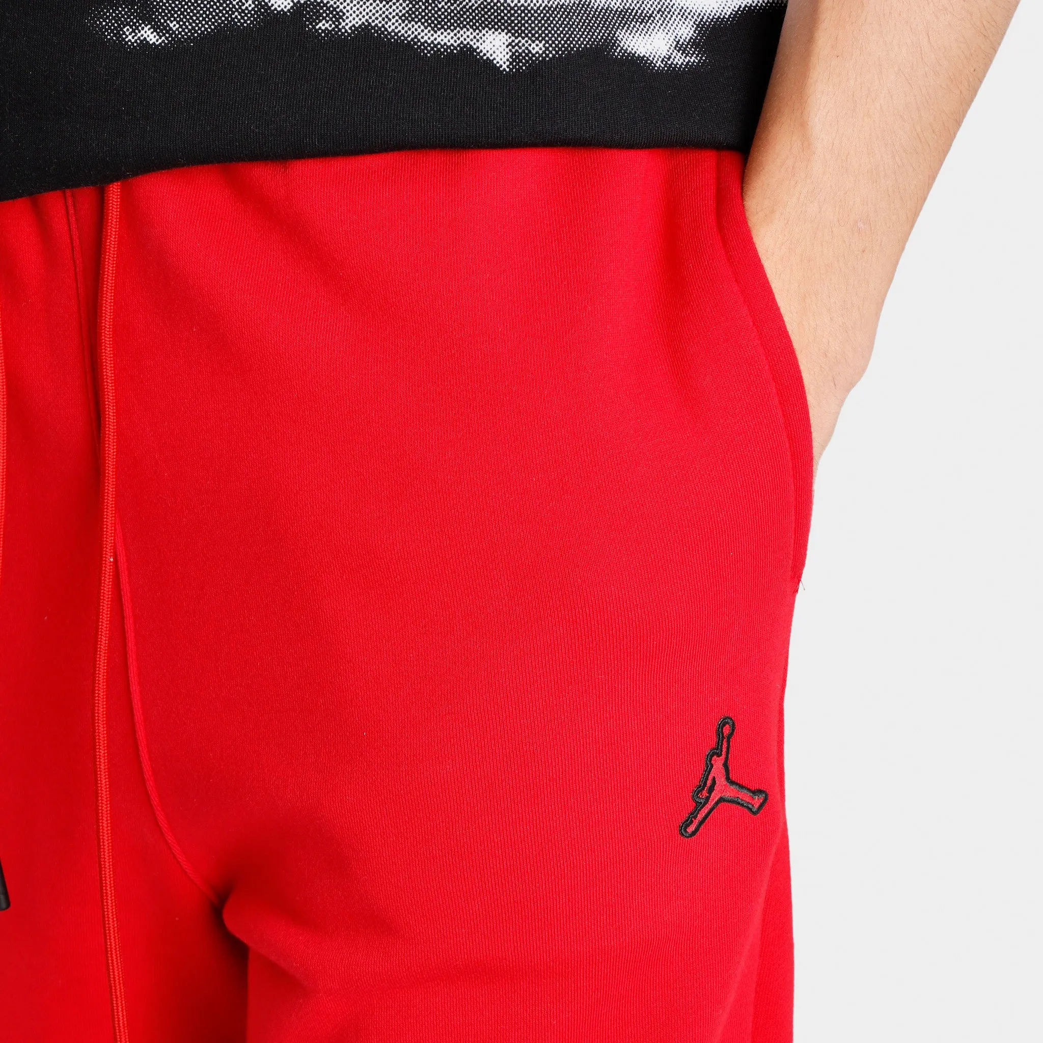 Jordan Essentials Fleece Pants / Gym Red
