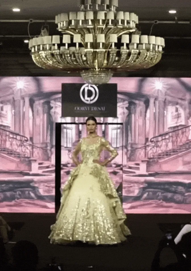 White and Gold Net-Based Designer Show-stopper Gown with Layered Trail