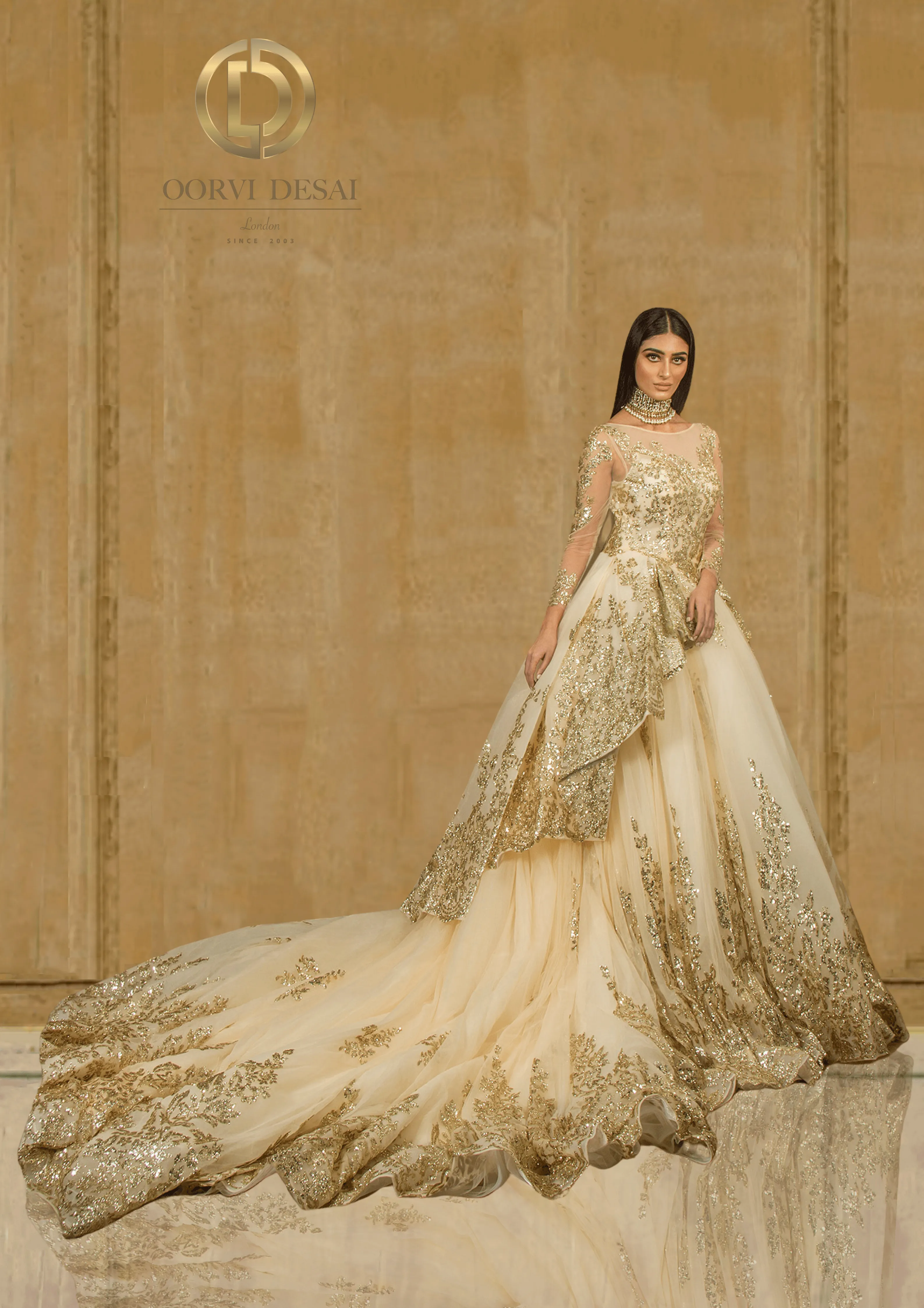 White and Gold Net-Based Designer Show-stopper Gown with Layered Trail